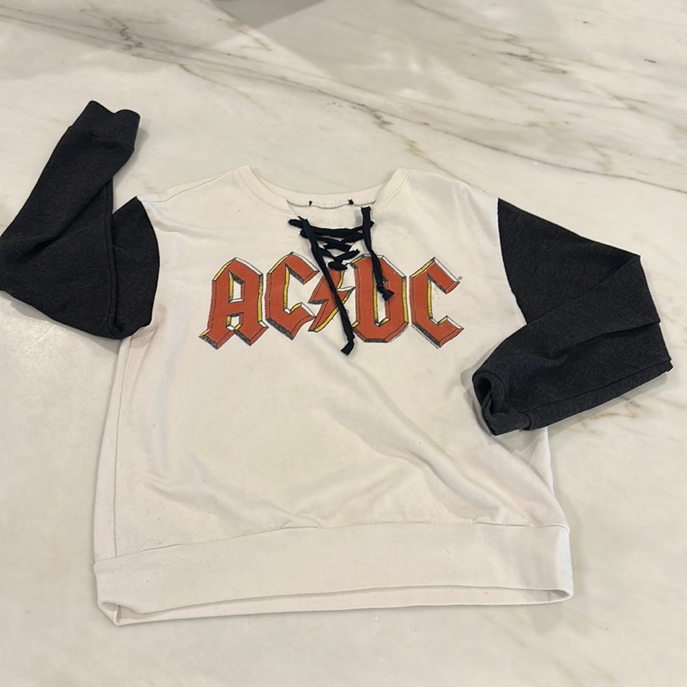 One of a kind AC/DC women’s sweatshirt with custom lace up at v neck.